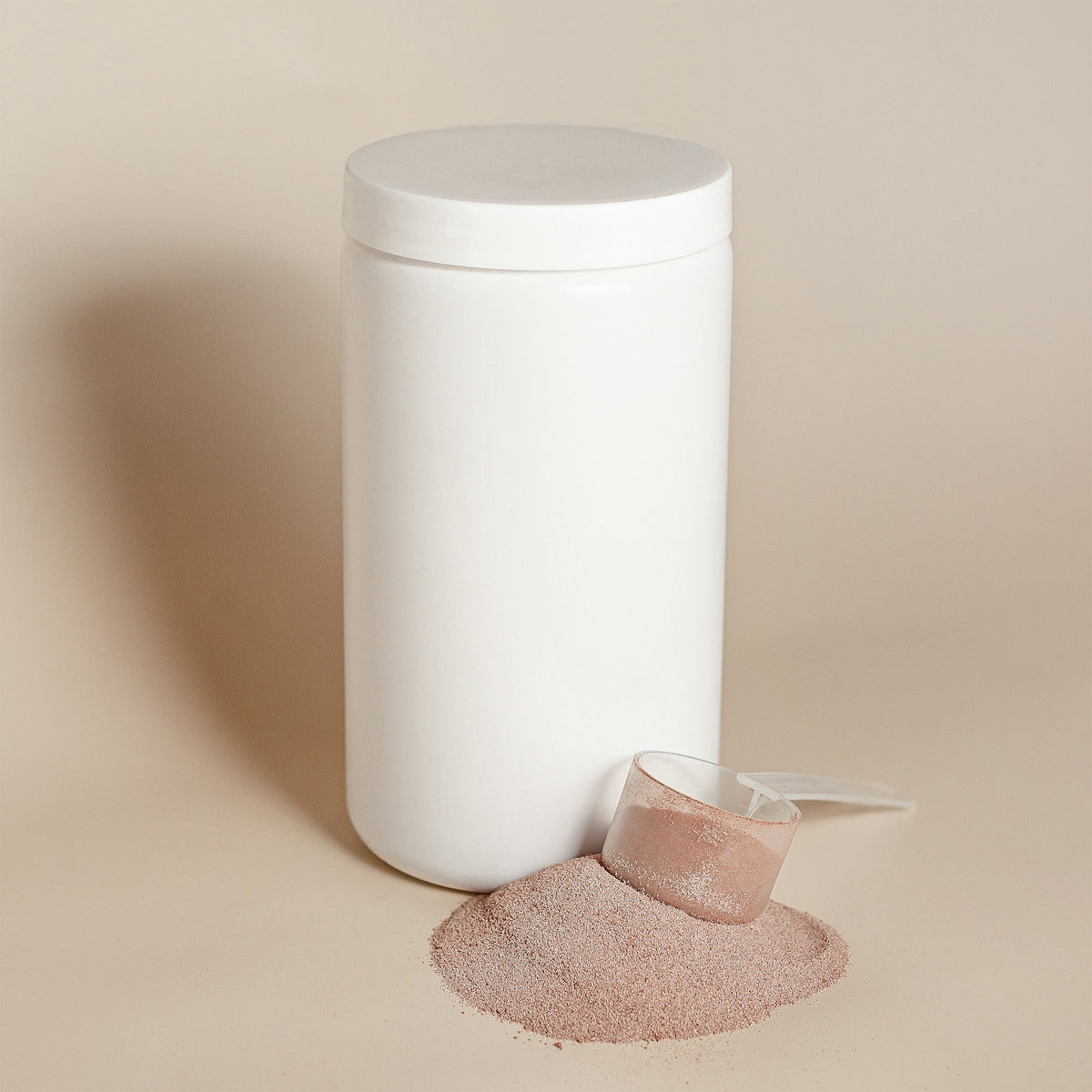 a white cylindrical object with a white lid and a white cylindrical object