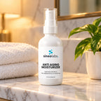 Anti Aging Moisturizer with Retinol & Ceramides alone on a clean white marble bathroom shelf in soft evening lamp light