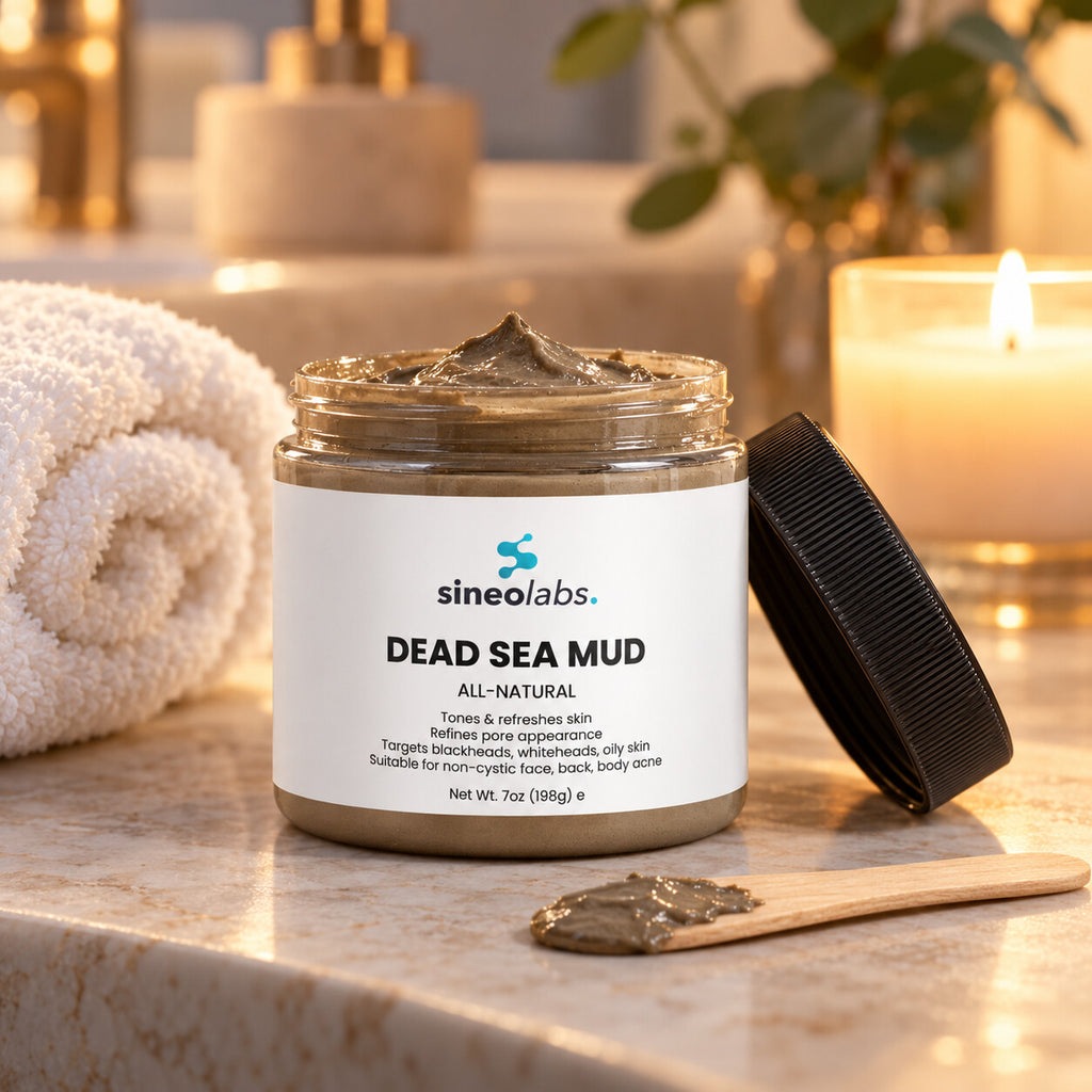 Dead Sea Mud Mask for Face & Body on a bathroom counter in soft evening light