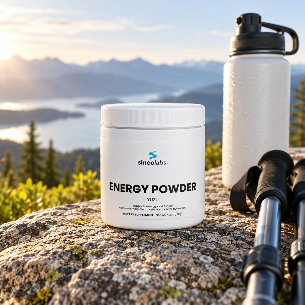Energy Powder, 200mg Caffeine, Yuzu on a flat granite rock at a mountain overlook in soft morning light