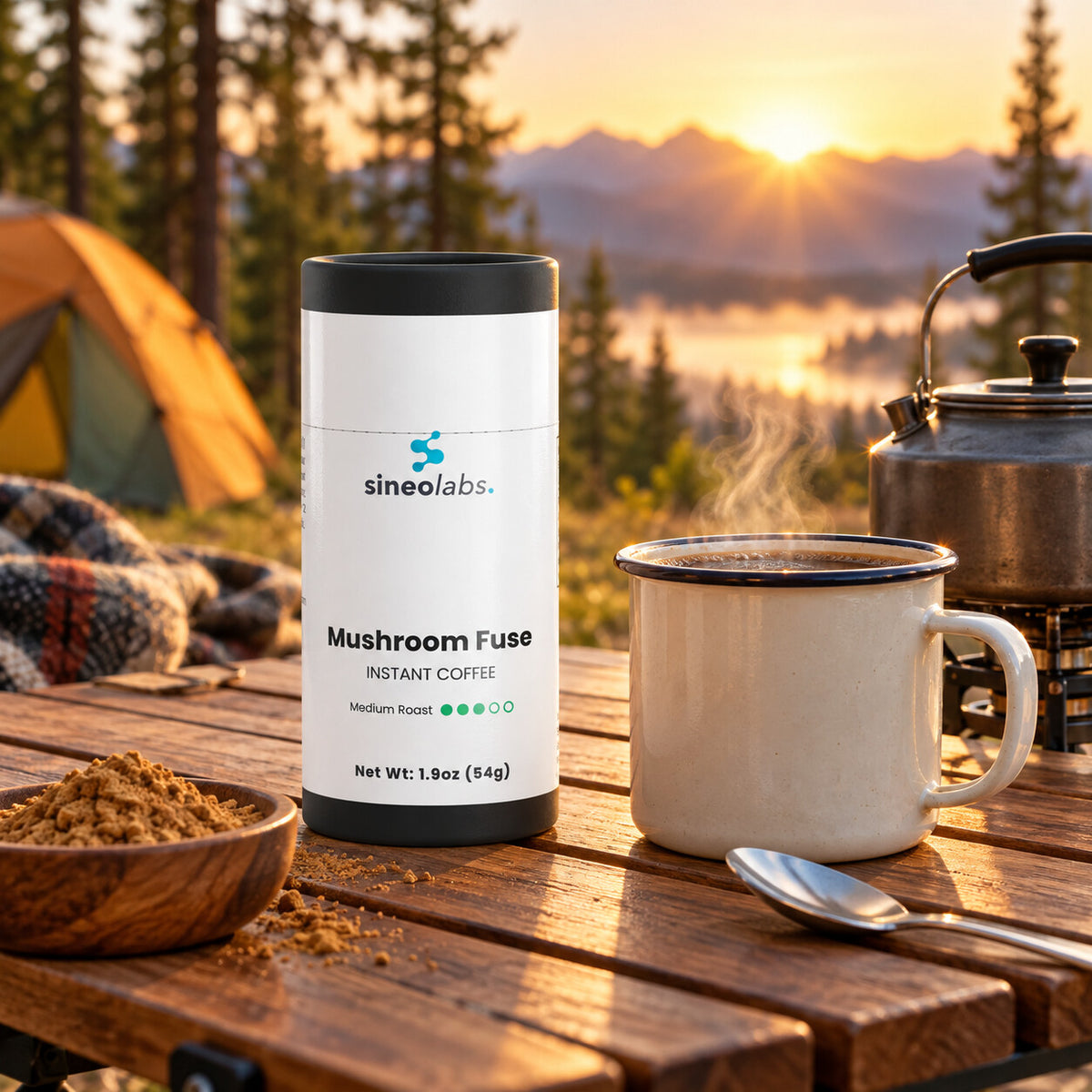 Mushroom Fuse Instant Coffee with Lion's Mane on a wooden camp table at sunrise beside a steaming enamel mug