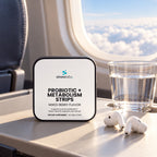 Probiotic + Metabolism Strips, 10 Billion CFU on an airplane tray table in soft window light